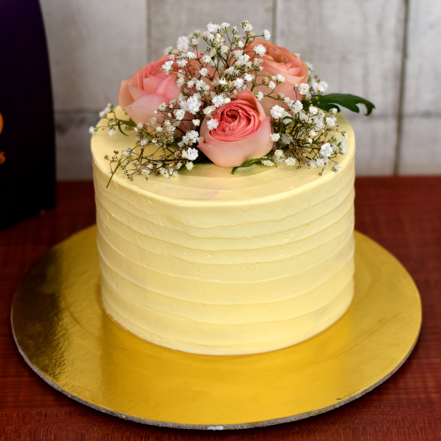 Online Exotic Pistachio Rose Cake Half Kg Gift Delivery in Bahrain FNP